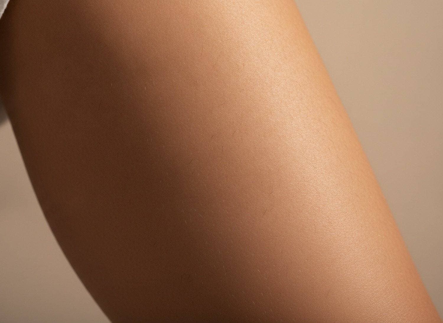 Before Smooth, hair-free skin after a full treatment course at The Body Bar MD