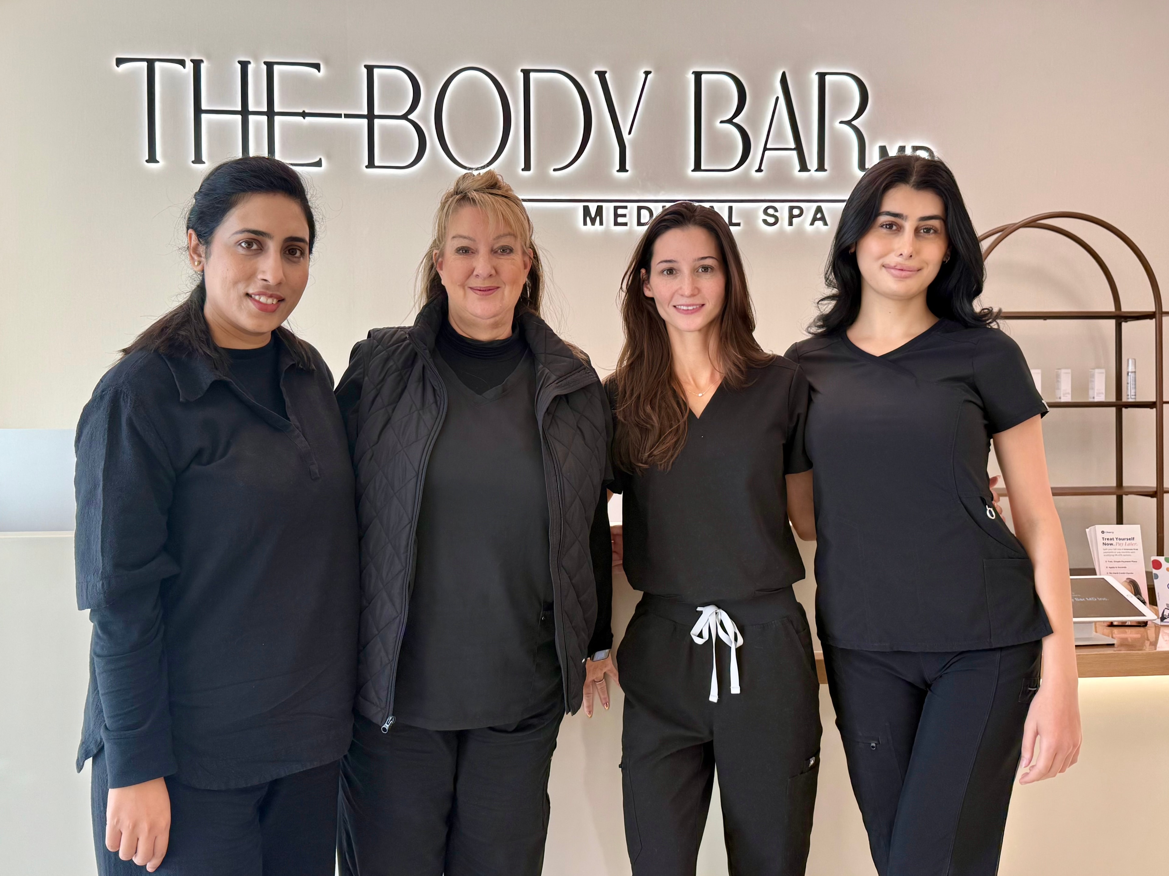 The Body Bar MD aesthetics team together at the reception in Ellicott City